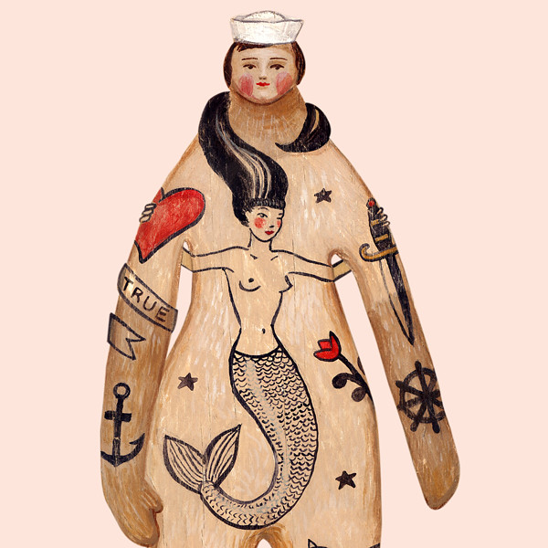 Tattooed sailor painted on wood using acrylic then'cut out' in Photoshop