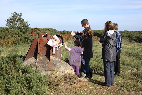 Investigating the remains of  the radar mast at Bard Hill