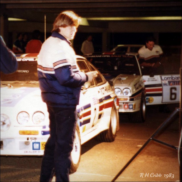 1983 at Bath scruteneering Henri Toivonen stands with his Rothmans Opel 