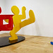 Keith Haring- Untitled (Two Dancing Figures), 1989 Painted Aluminum Sculptures 120 x 155 5_8 x 113 3_8 inches  and Breakers, 1987, Painted aluminum, 45 1_2 x 60 x 63 inches
