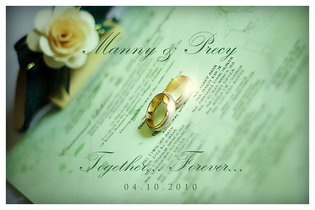 Our homemade wedding invitation and wedding rings