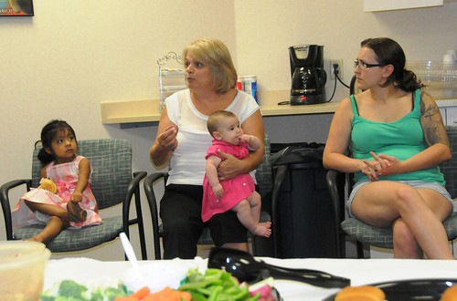 A WIC peer counselor provides encouragement to new mothers at a community breastfeeding support group in West Virginia.