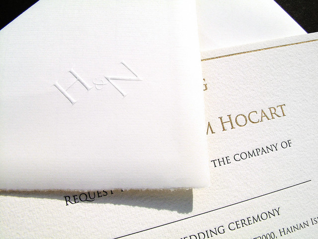 Detail showing embossed envelope and letterpress printed wedding invitation