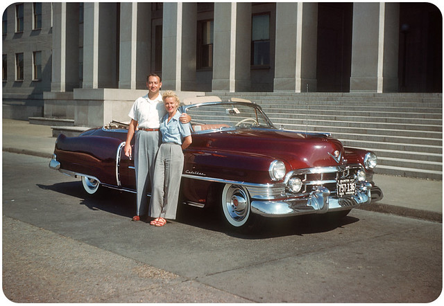 a 1952 Cadillac convertible in rich burgundy with natural interior