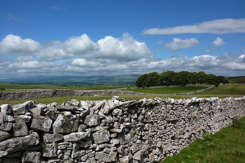 Limestone dry stone walling and blue skies