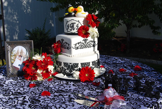red white and black damask wedding cake in black damask with bright red