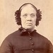 Older victorian woman with unusual head gear