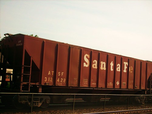 A former Atchinson, Topeka & Santa Fe covered hopper car in transit. Riverside Illinois. July 2007. by Eddie from Chicago