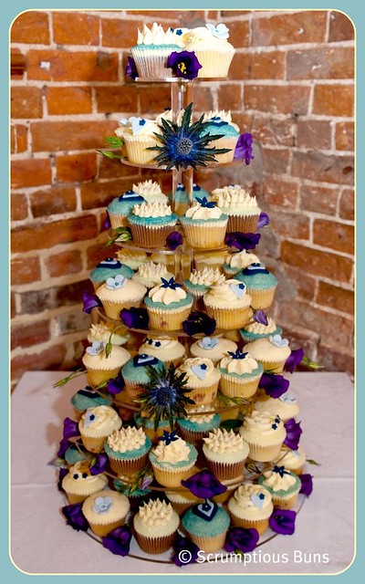 Blue Thistle Wedding Cupcake Tower Purple Blue Ivory wedding cupcakes 