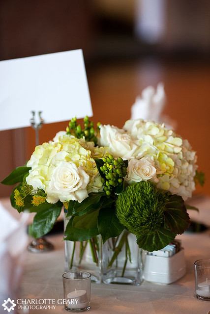 White and green wedding centerpiece From a wedding at the Garden of the 