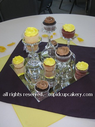 Claire David's wedding 125 standard size cupcakes set up as centerpieces 
