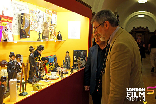 Ray Harryhausen's Myths & Legends Exhibition : John Landis browsing pieces from the Charlie Chaplin Exhibition - London Film Museum by Craig Grobler