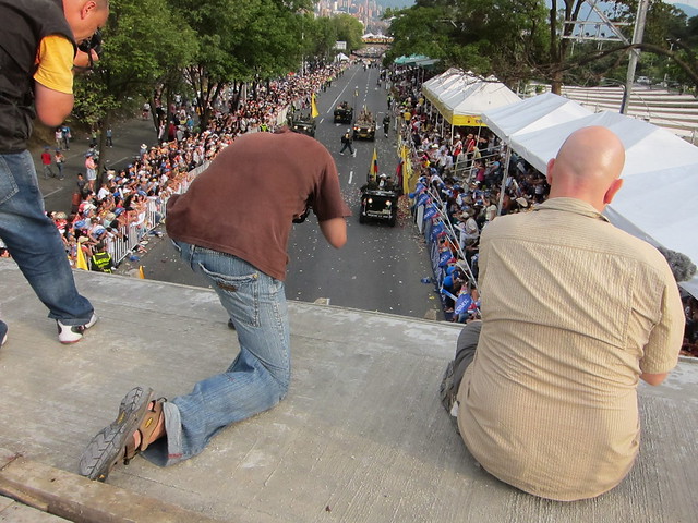 Troy (left) and Drew (right) taking advantage of our good views atop the bridge to photograph and video the parade.