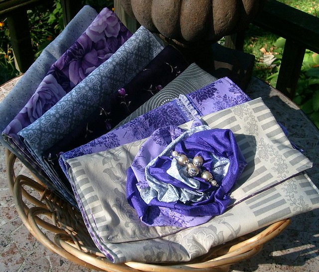 coordinating Bridesmaid and Bridal clutches in purple and gray colorways by