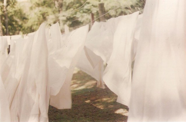white sheets on a clothes line