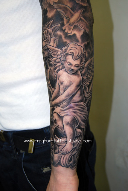 Religious sleeve 142 Tattooed by Ray at The Tattoo Studio Crayford