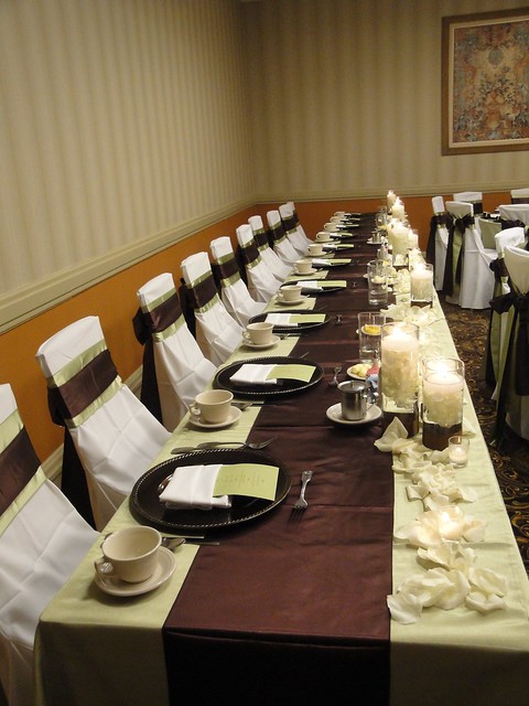 Elegant ivory green and brown wedding head table in our Carolina Ballroom