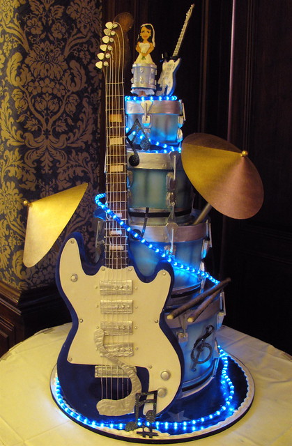 Wedding cake for a woman who plays drums a man who play guitar