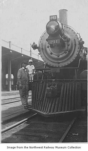 George and Melrine Longworth with Northern Pacific locomotive #241, Seattle, ca. 1914