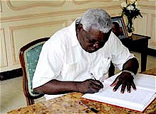 Cuban Vice-President Esteban Lazo Hernandez signing the book of condolences for the recently passed Rev. Lucius Walker of the United States who was a longtime friend of the Cuban Revolution. Walker led the IFCO agency and the Pastors for Peace. by Pan-African News Wire File Photos