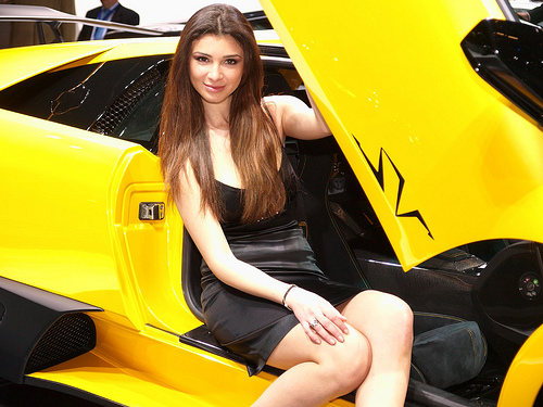 LamborghiniMurci lago LP6704 SV a Sexy girl posing in a black dress next