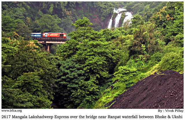 Mangala Lakshadweep express passes over a bridge near the Ranpat waterfall