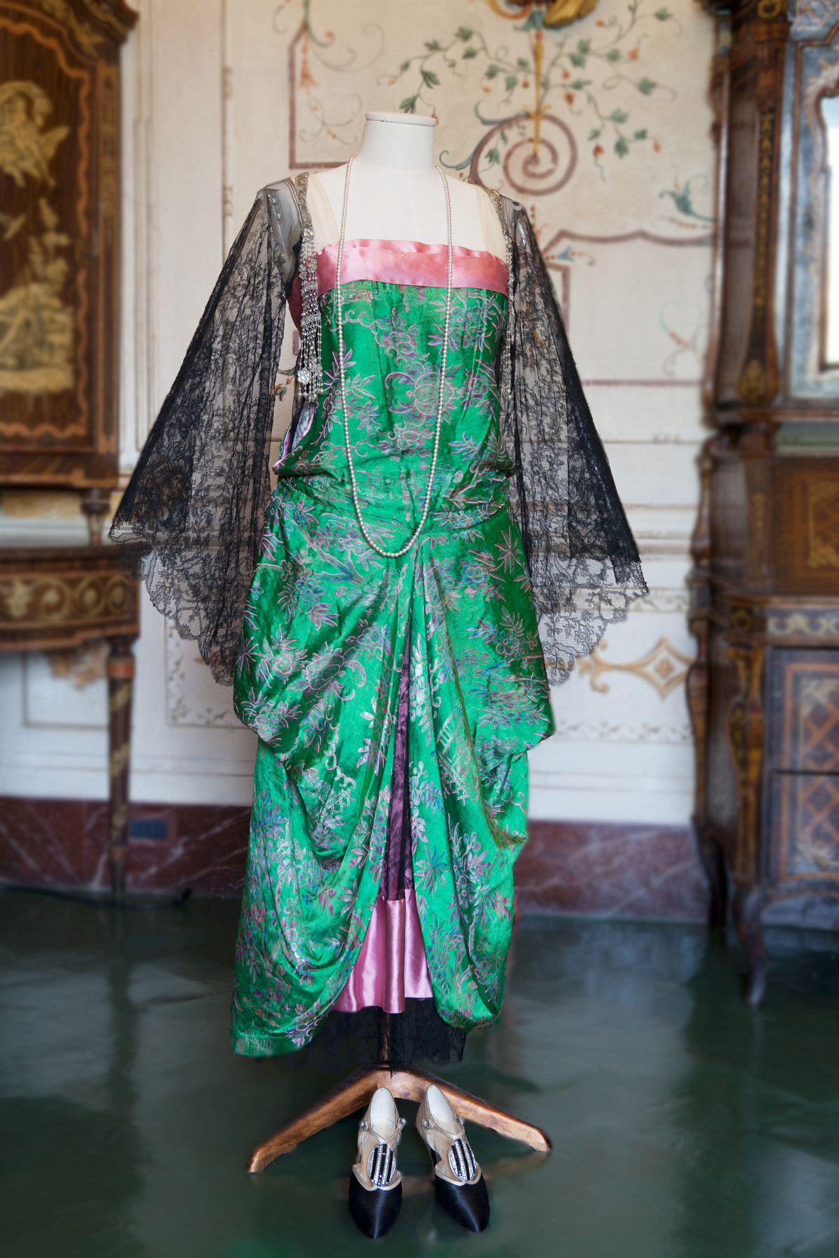 1920s. Callot Soeurs. Green and Pink Silk. Passementerie tassels composed of rhinestones, pearls and beads that hang from either shoulder. Acton Art Collection - Villa La Pietra