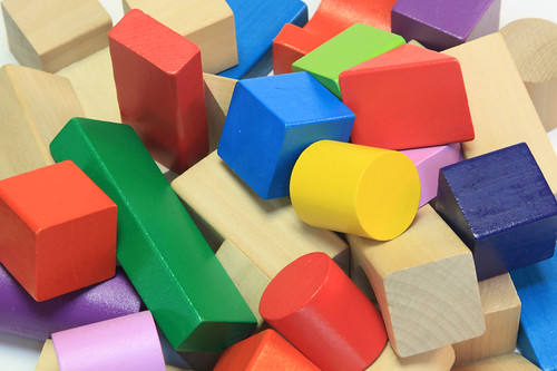 stack of colorful wooden building blocks