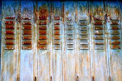 Rusted blue shutters