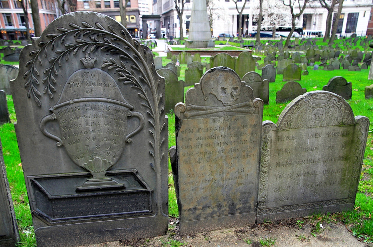 Three headstone carving designs placed side by side. Credit Ingfbruno