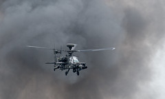 Apache emerging from a large explosion