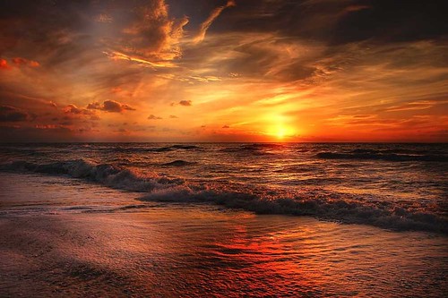 holiday-packages-hotels-travel-agency-sunset-over-beach