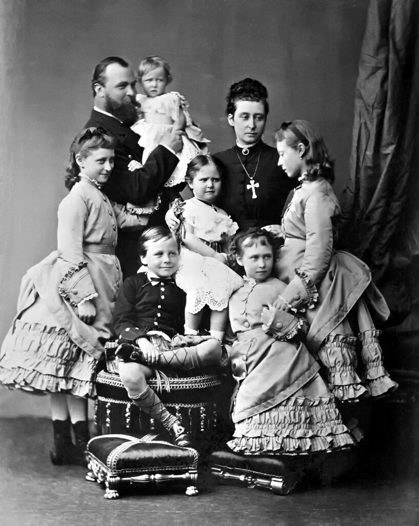The Hessian family in May 1875 (clockwise from far left)—Ella, Grand Duke Ludwig holding Marie, Alice, Victoria, Irene, Ernie and Alix in the center