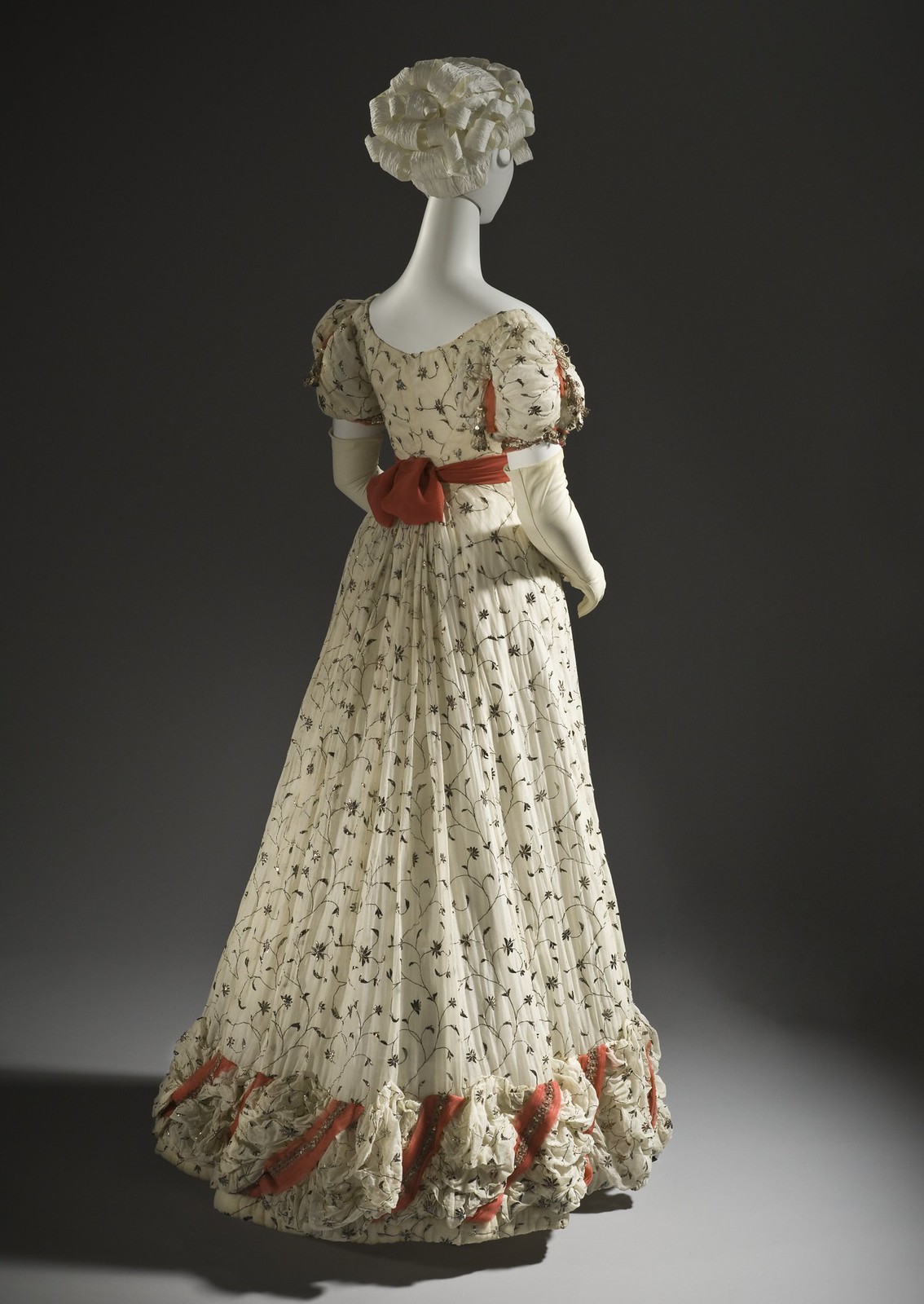 1820 Ball gown. British. Cotton plain weave with metallic thread embroidery and silk ribbons with metallic passementerie and tassels. LACMA