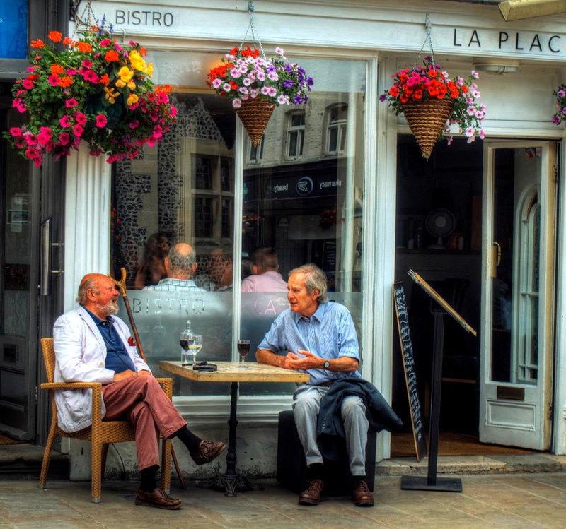 Time to talk over a glass of wine at La Place Bistro. Credit Neil Howard, flickr