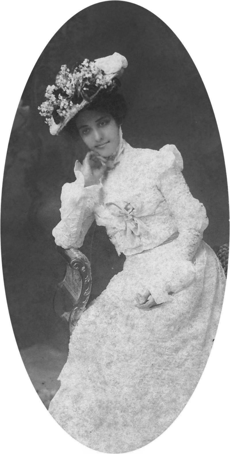 Kaiulani in white gown and hat, photograph by J. J. Williams