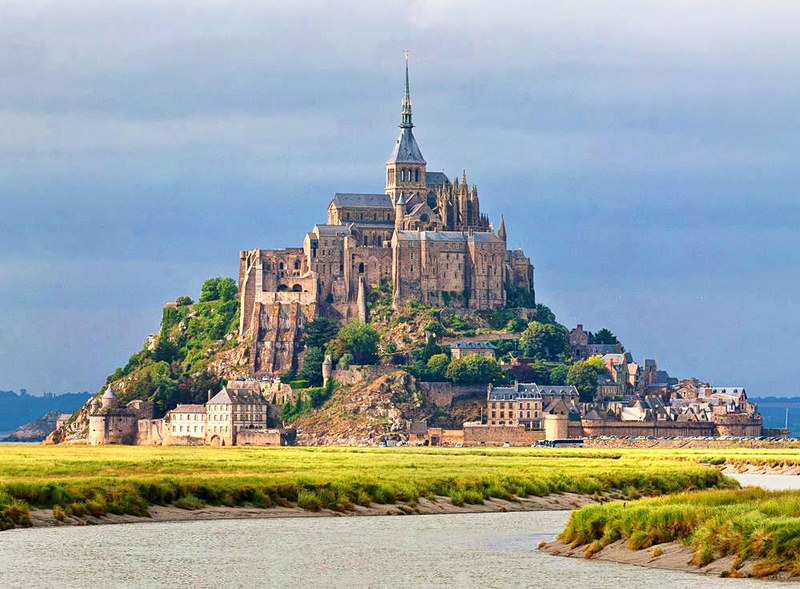 Mont Saint-Michel as viewed along the Couesnon River in Normandy, France. Credit David Iliff