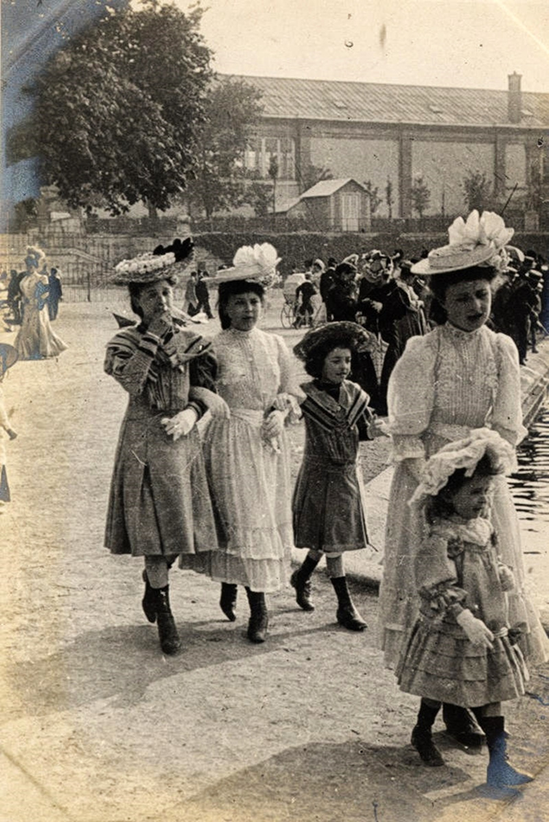 A group of young women and children walking in the Tuileries Garden, Paris, 1906