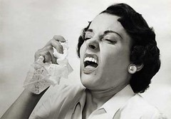 Photo:sneezing woman By:sidknee23