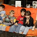 kids watching a movie at the party