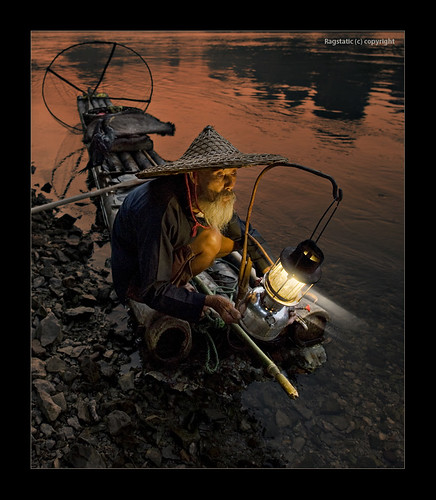 world life china old travel light shadow portrait people mountain fish man color bird heritage nature water hat river beard relax landscape flow liriver still fishing fisherman nikon exposure view dusk earth stones guilin rags quality culture scene cormorant raft lantern ng shallow karst publication peasant nationalgeographic subtle travelogue guangxi lifescape xingping d700
