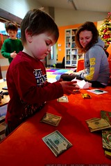 sequoia helps aunt megan count her birthday money   … 