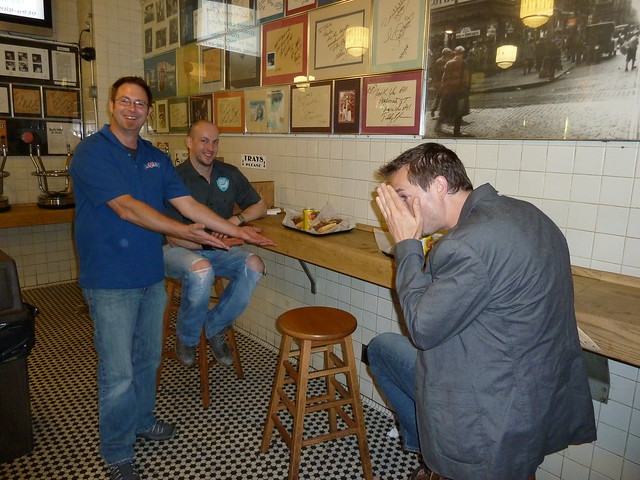 Later night at Jim's Steaks Bill Covaleski showcases our cheesesteaks as James Watt looks on & Greg Koch tries to hide his face