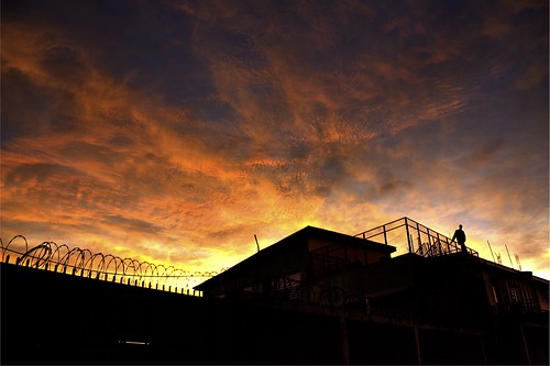 sunset silhouette haiti wire guard orphanage barb portauprince ontheoutside