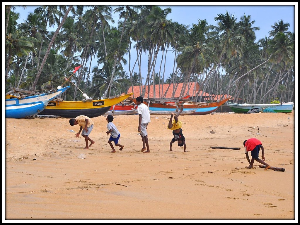 Kids messing around on a Wadduwa Beach