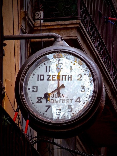 'Timeless' vintage Zenith Clock Sign in the Carrer de l'Espaseria, Barcelona Spain