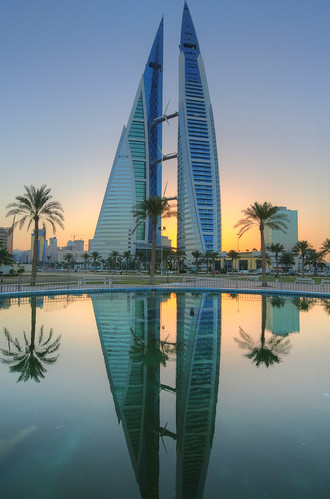 world reflection sunrise bahrain high nikon dynamic middleeast center twintowers trade range f28 hdr manama 1424mm fotocompetition fotocompetitionbronze fotocompetitionsilver