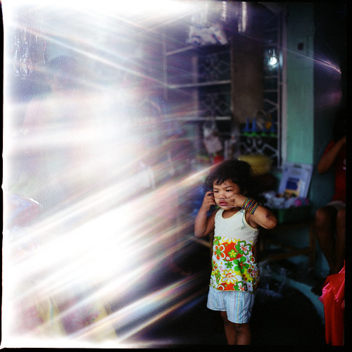 light man 120 film girl analog mediumformat glare child philippines young hasselblad half leak cavite quezoncity 500cm hasselblad500cm ilovefilm fujifilmpro800z