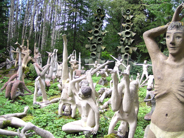Statues of Veijo Rönkkönen doing yoga
