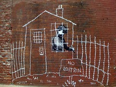 Banksy in Boston: Overview of the NO LOITRIN piece on Essex St in Central Square, Cambridge